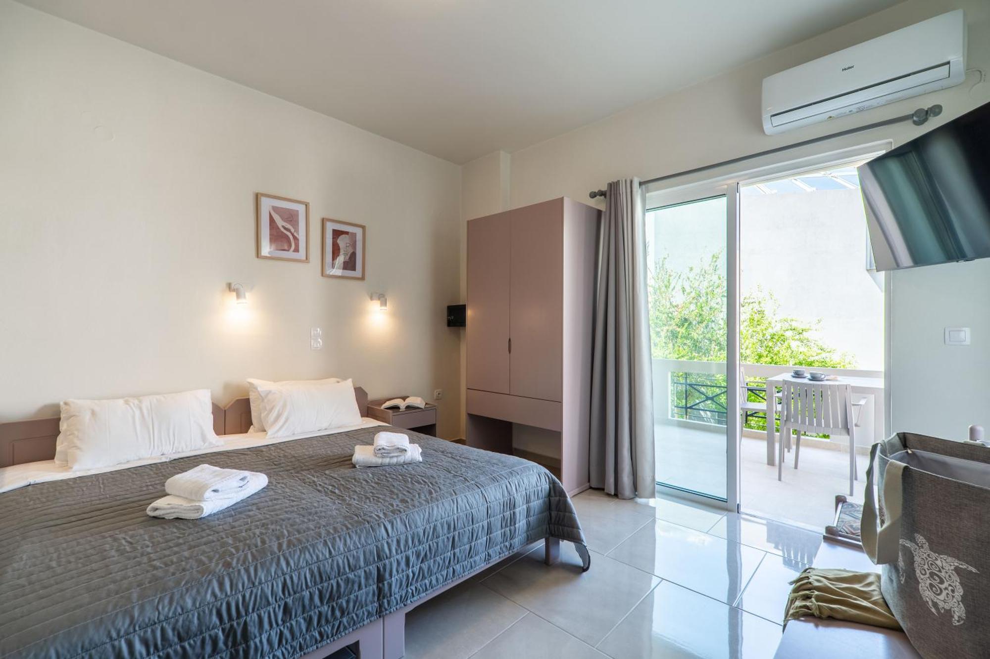 Manos Beachside Apartments Agia Marina Rom bilde